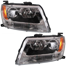 Load image into Gallery viewer, 2009-2013 Suzuki Grand Vitara Headlights - Driver &amp; Passenger Side (17340595)