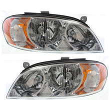 Load image into Gallery viewer, 2002-2004 Kia Spectra Headlights - Left &amp; Right, w/ Bulbs (0K2NB51040B)